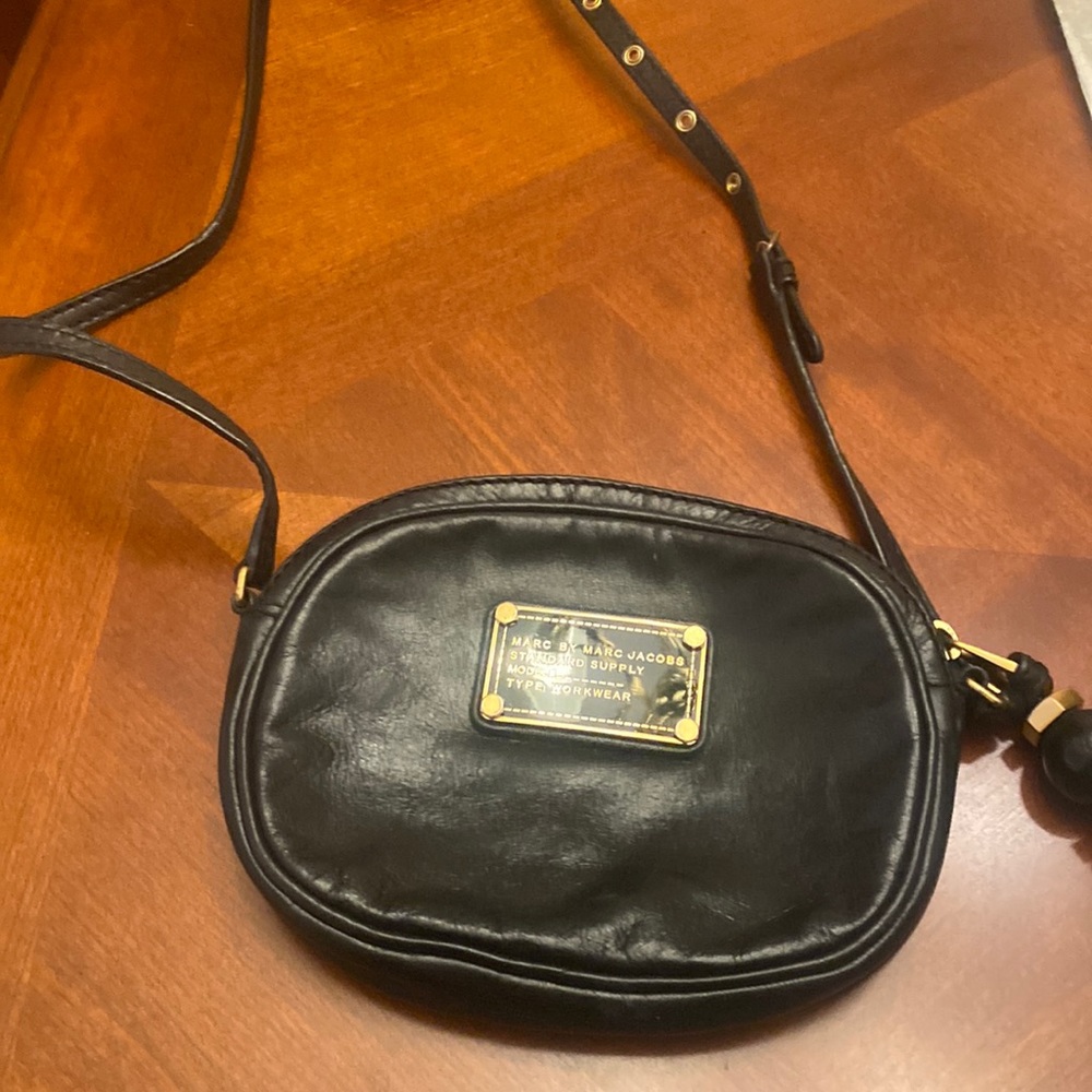 Cute travel bag by Marc Jacobs. Used but in EXCELLENT condition.